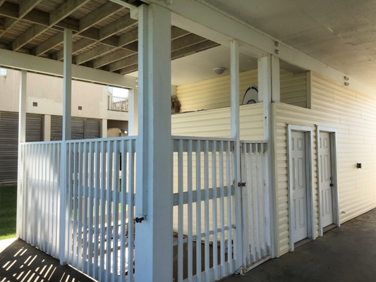 Image of an outdoor storage pen added on to the garage of a Galveston beach house.  Image Copyright © 2020 Brad Larkin