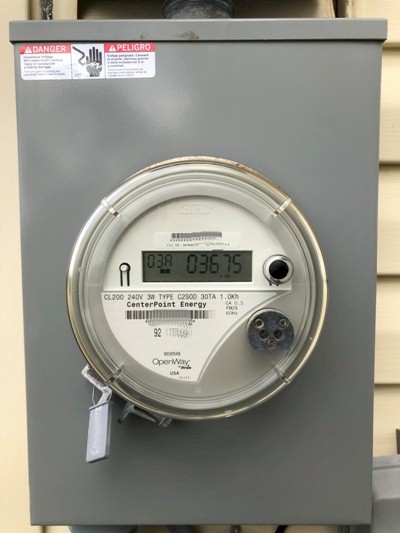 Image of an electrical utility meter on a Galveston home.  Image Copyright © 2019 Brad Larkin