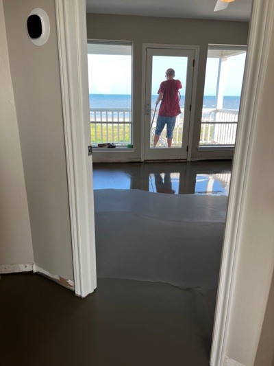Image of LevelQuick RS being applied wet in a beach house in Galveston, Texas. Image Copyright © 2023 Brad Larkin