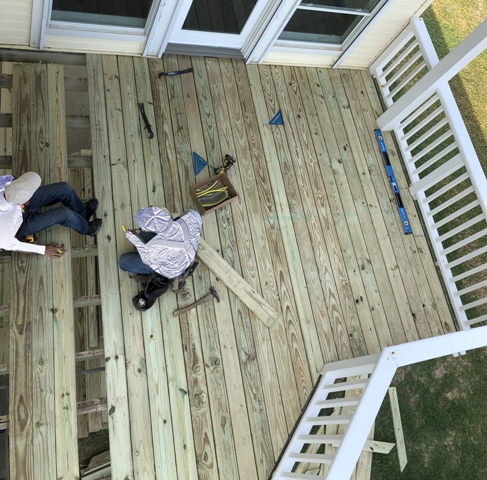Image of outdoor deck construction in-progress on a Galveston beach house. Image Copyright © 2021 Brad Larkin