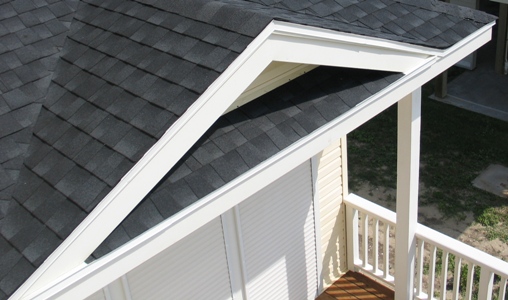 Image of painting and corrosion remediation on beach house flashing.  Image Copyright © 2009 Brad Larkin