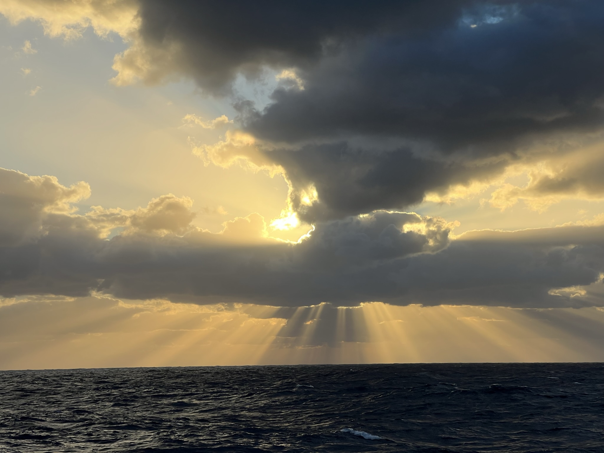 Image of a sunburst vista just after sunrise on the Texas Gulf Coast from a Galveston beach house. Focus on enjoying the good life and let Tracy Calvert Home Repair and Maintenance handle your home maintenance work.  Image Copyright © 2022 Brad Larkin