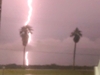 Image of cloud-to-ground lighting near the beach in Galveston, Texas. Image Copyright © 2020 Brad Larkin