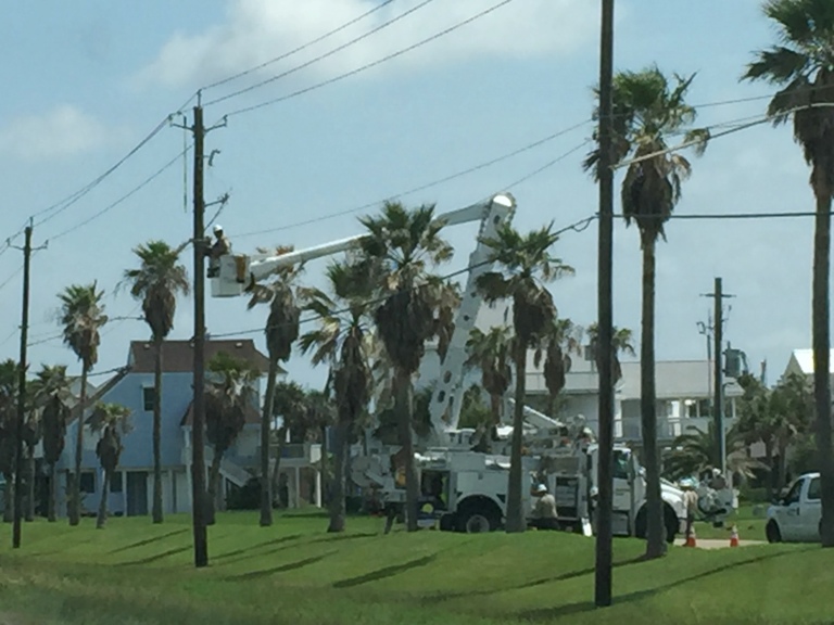 Image of utility repair crews working on Galveston island following Hurricane Harvey. Image Copyright © 2017 Brad Larkin