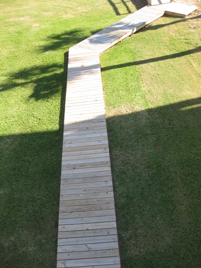 Image of newly constructed wooden walking path in Galveston, Texas. Image Copyright © 2009 Brad Larkin